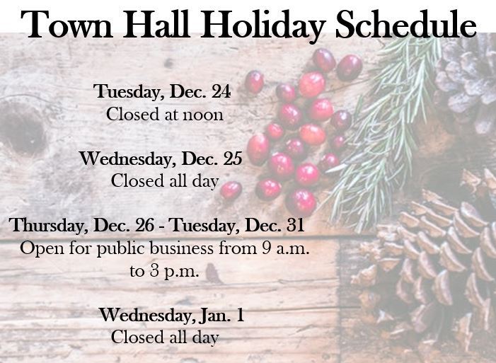 A faded image of a pine cone, greenery and cranberries on a wooden board